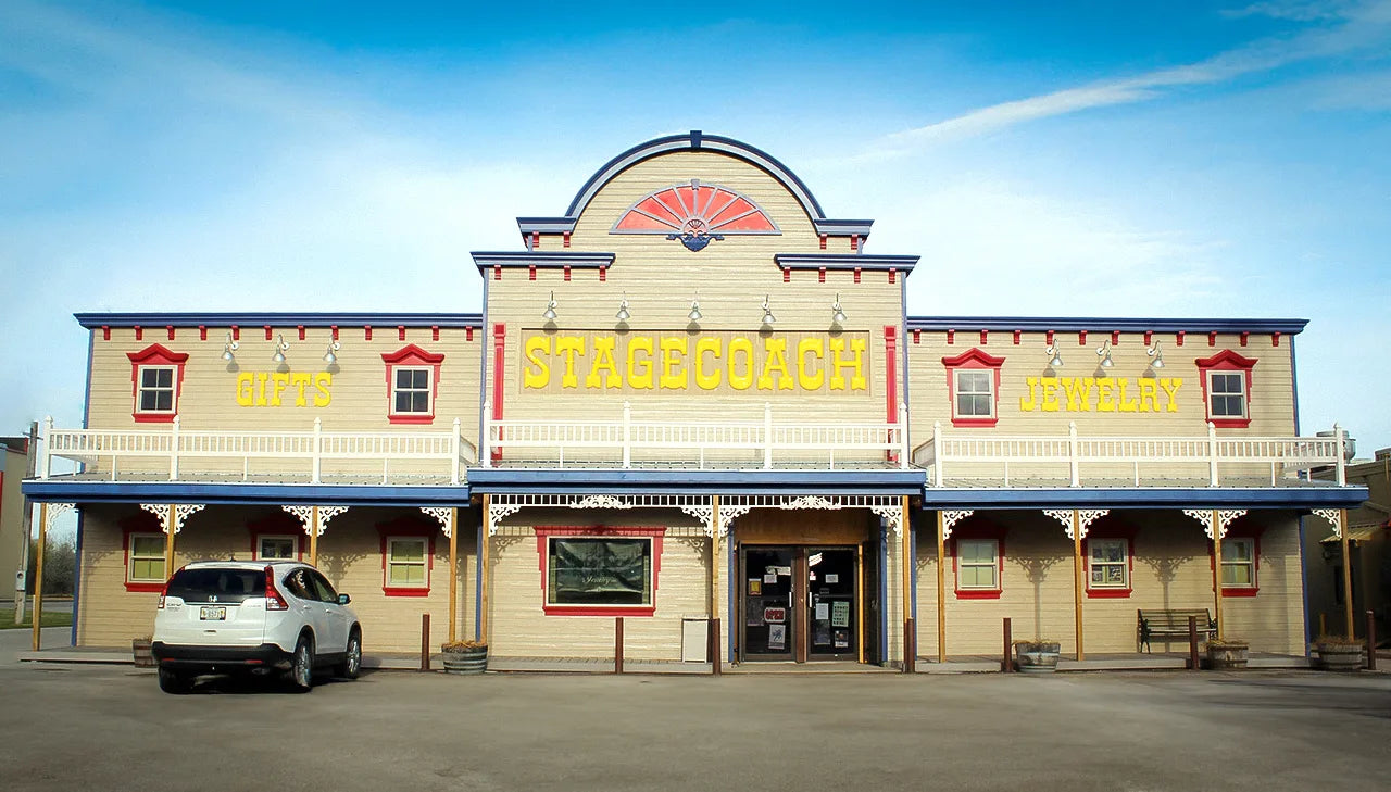 Stagecoach storefront with its large yellow sign and central entrance