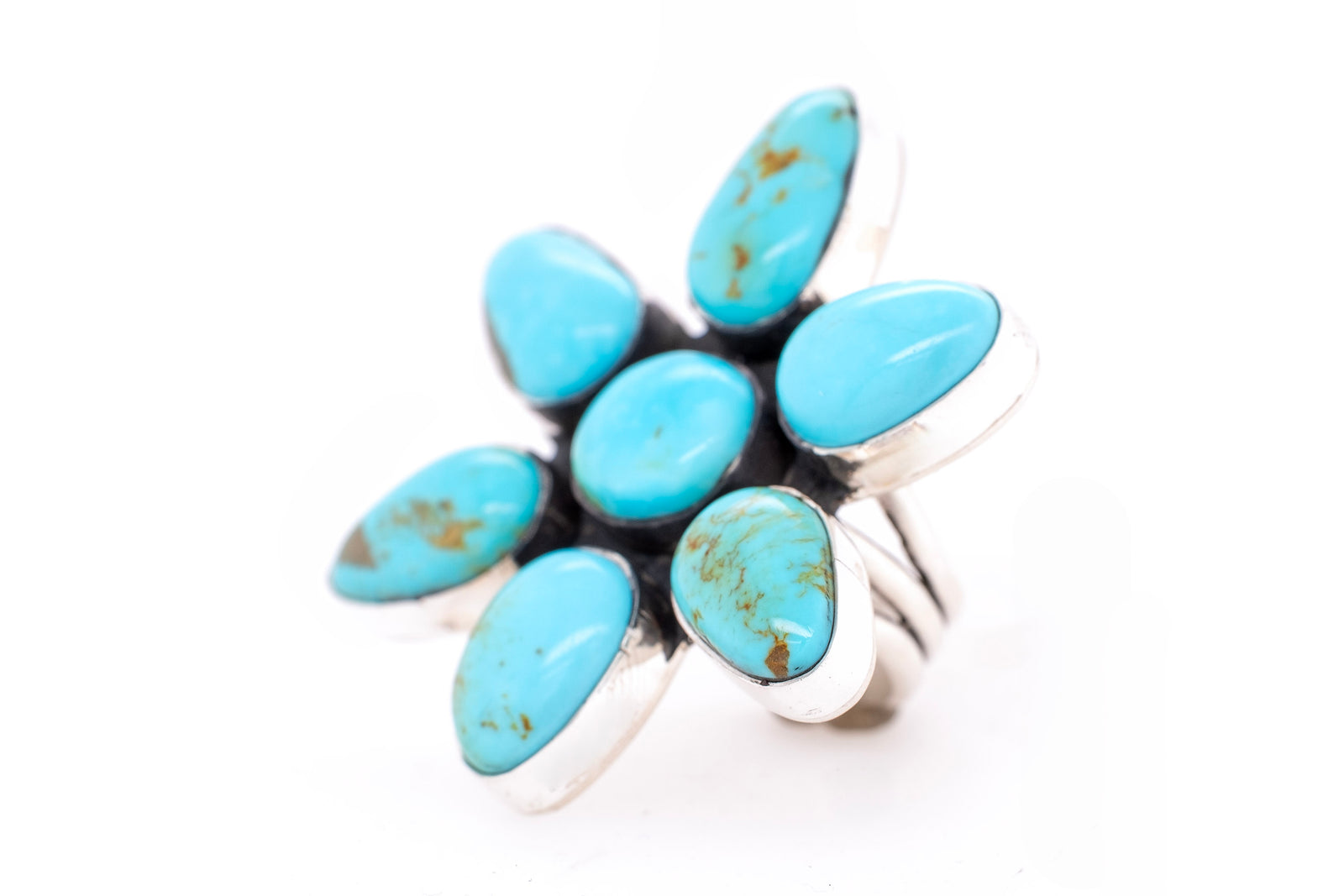 Campitos Turquoise Flower Ring by Skylar Glandon on a White Background