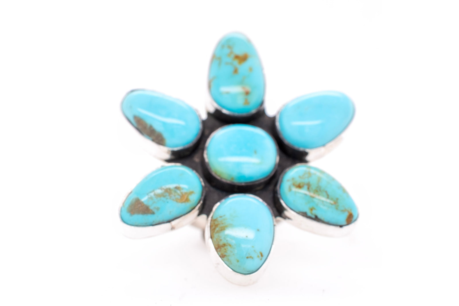 Campitos Turquoise Flower Ring by Skylar Glandon on a White Background