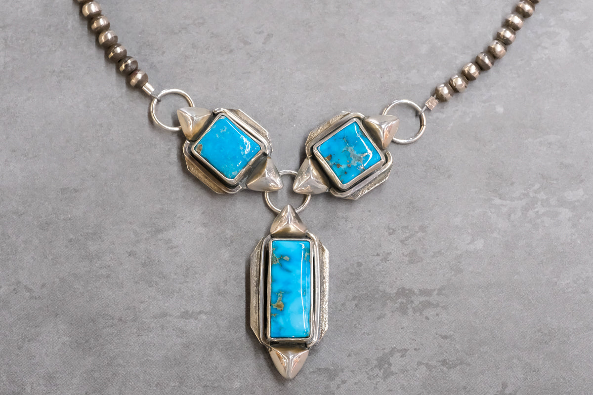 Handmade Sierra Nevada turquoise necklace with three stones, Navajo Pearls, and silver accents by Gary Glandon