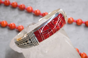 David Rosales rosarita bracelet with orange beads in the background