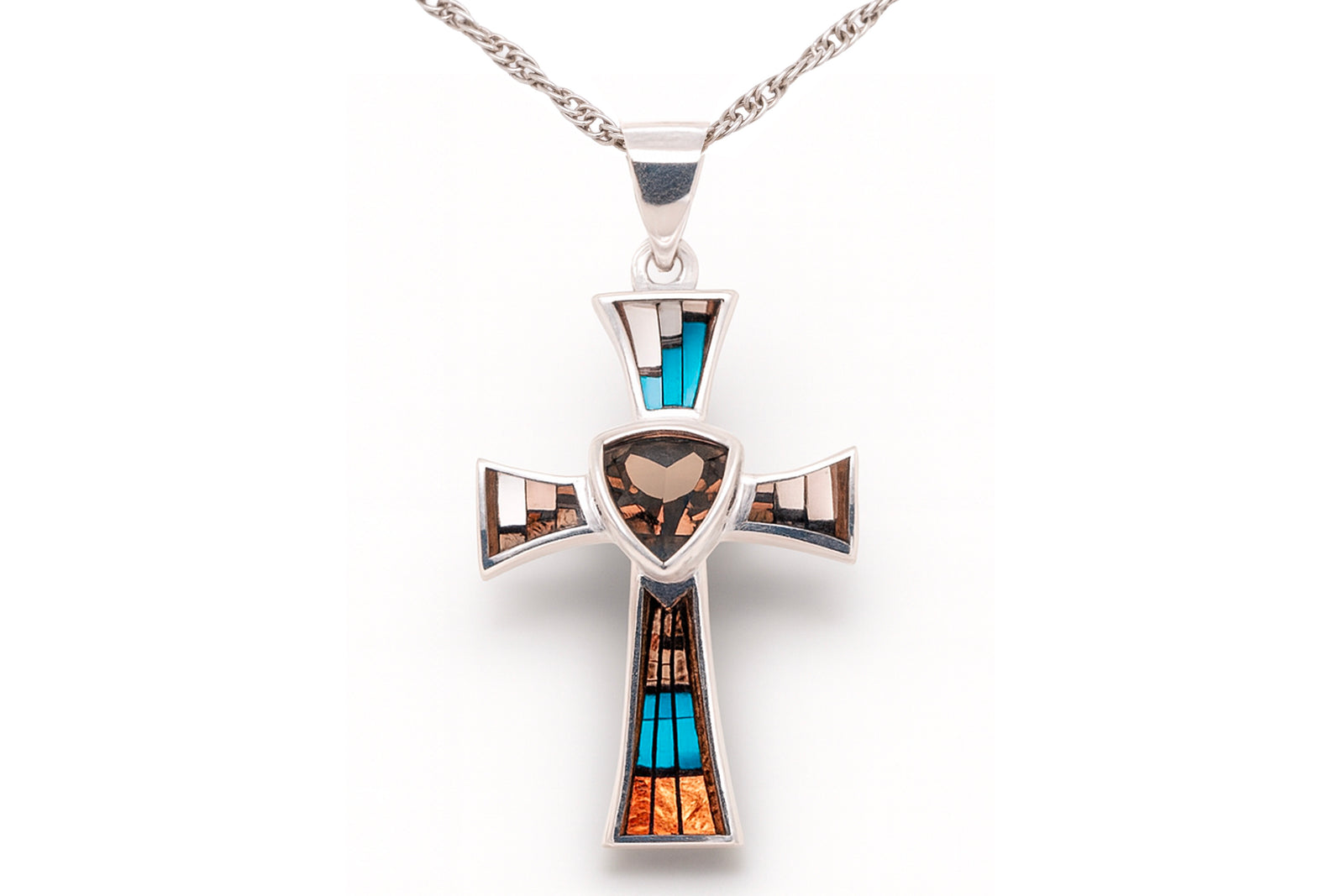 David Rosales Cross Pendant Hanging on a Silver Chain