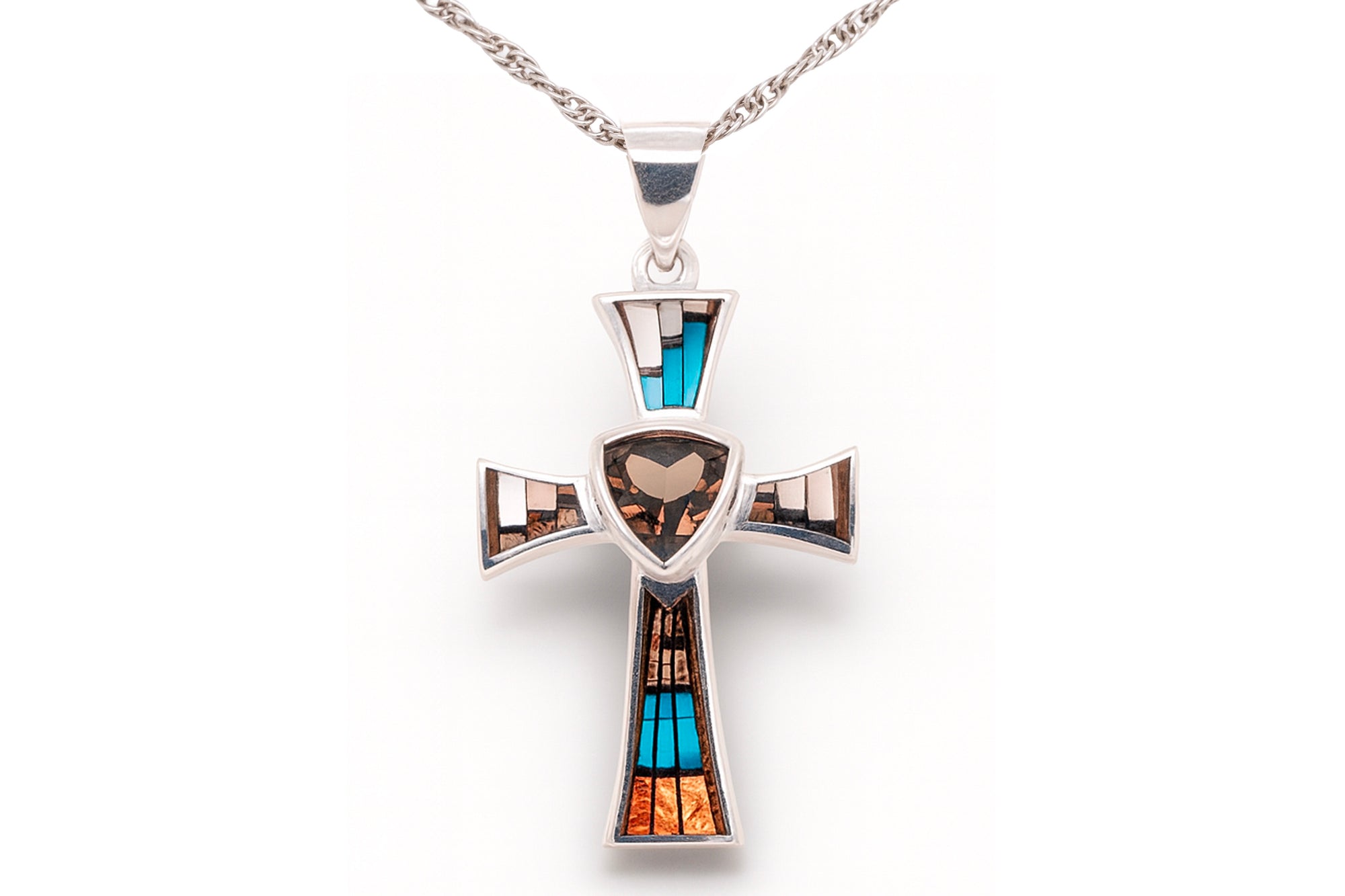 David Rosales Cross Pendant Hanging on a Silver Chain