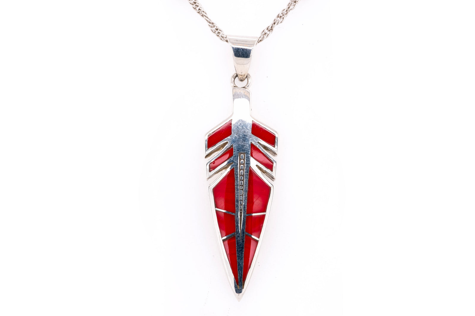 Red Rosarita in a silver feather pendant necklace on a white background