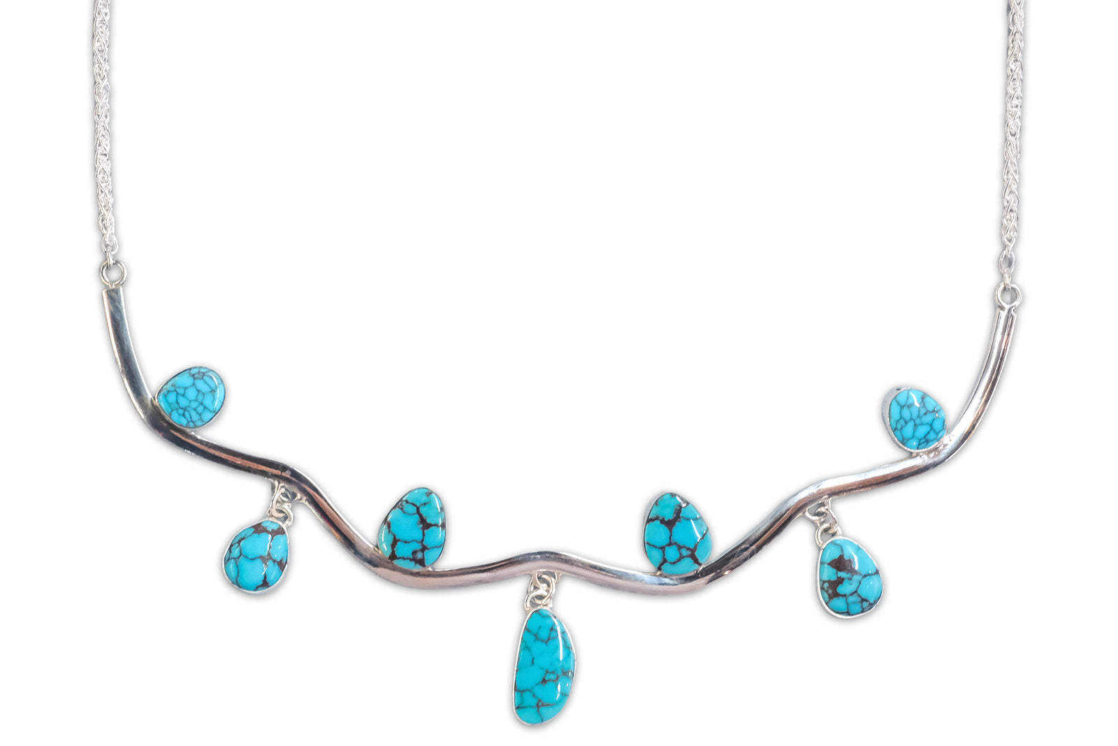 Necklace with turquoise stones on a white background
