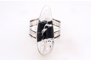 Silver ring with White Buffalo stone on a white background